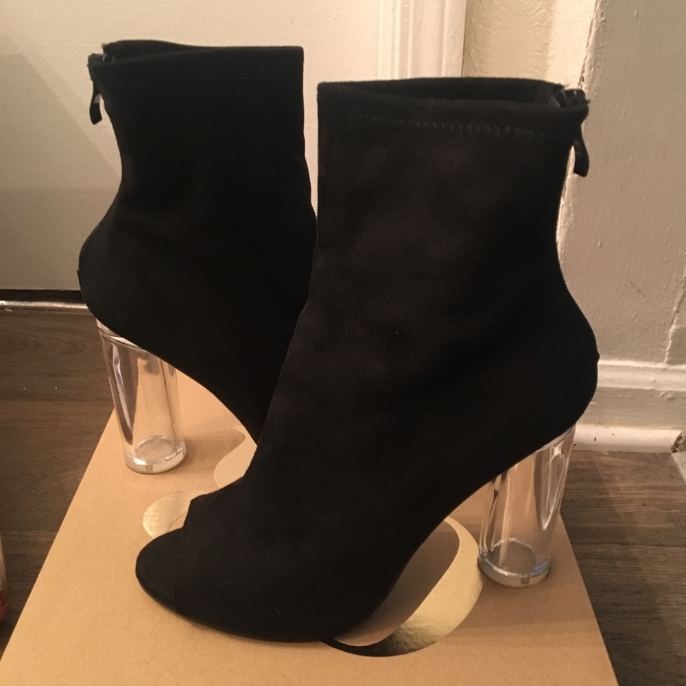 Cute black booties with a lucite heel!